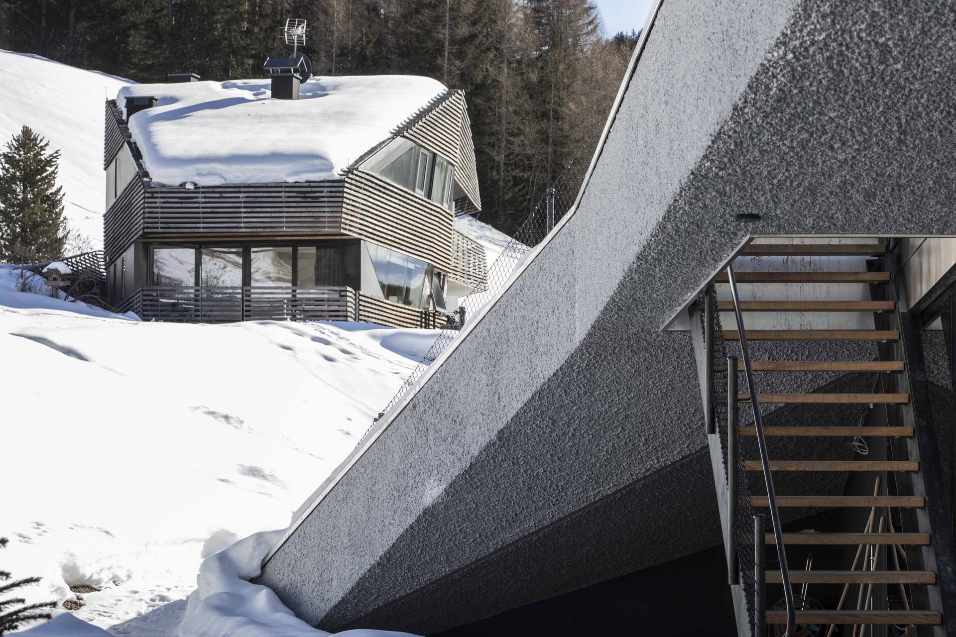 Stylish holidays at the Residence Paramount Alma Modern house with wooden elements in a snowy forest